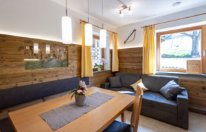 Kitchen with living room of the apartment Santner in the Dolomites